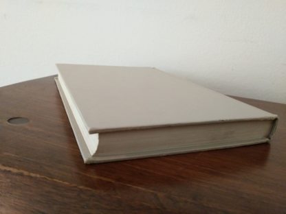 Binding without dustjacket of a 1953 novel, Little House in the Big Woods, uniform edition