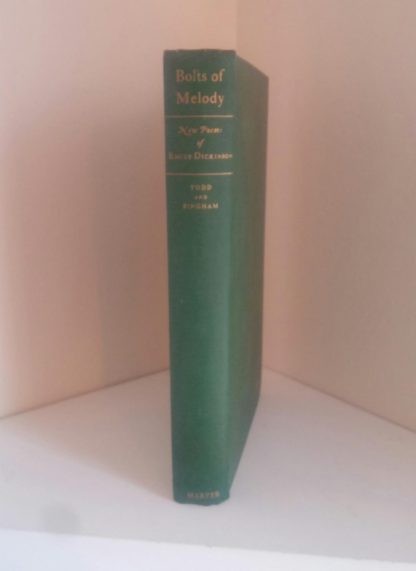 Spine view of a 1945 First Edition of Bolts of Melody by Emily Dickinson