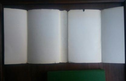 back side of the dust jacket for a 1945 First Edition of Bolts of Melody by Emily Dickinson