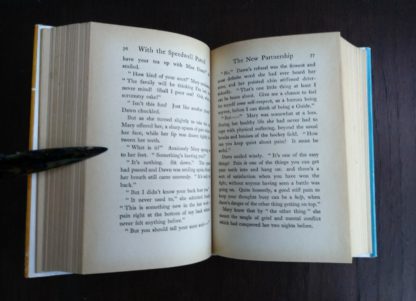 page 76 and 77 in a copy of The Peal Book of Girl Guide Stories with three full length stories