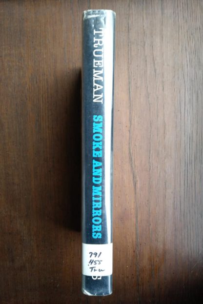 spine view of a withdrawn, 1980, ex-library copy of Smoke & Mirrors by Peter Trueman