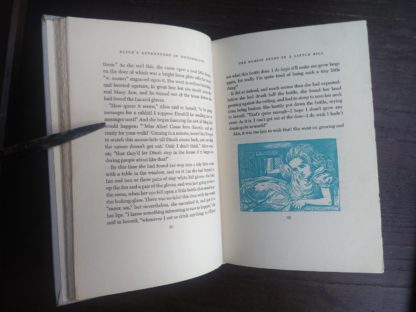 page 52 and 53 of Alices Adventures in Wonderland in a childrens Junior Deluxe Editions book, Circa 40s -50s