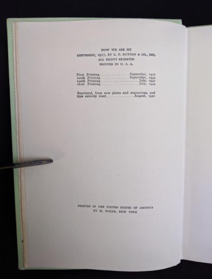 copyright page in a 1950 copy of Now we Are Six by A. A. Milne. First Reissue Edition