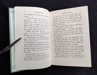 page 8 and 9 inside a 1904 copy of A Saxon Maid by Eliza F. Pollard. Published by Blackie & Son Ltd. London
