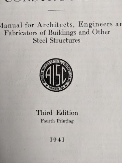 1941 copy of Steel Construction published by American Institute Of Steel Construction- third edition - fourth printing - title page up close