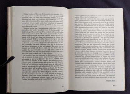 Page 122 and 123 inside a 1958 first edition copy of KLONDIKE - The Life and Death of the Last Great Gold Rush by Pierre Berton