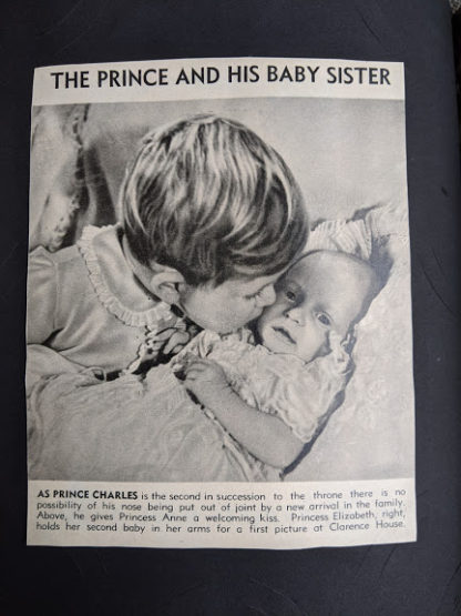 Prince Charles gives a kiss to his baby sister Princess Anne