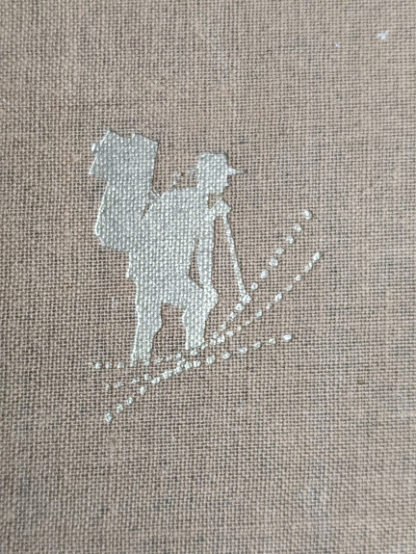 gold gilt stamp on front cover of a 1958 first Canadian edition of KLONDIKE - The Life and Death of the Last Great Gold Rush by Pierre Berton