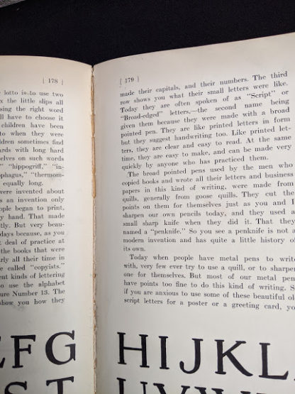 partial seam split up close in a 1926 copy of Master Book 1 - Beginning the Use of Tools and Materials Published by Lewis E Myers & Company