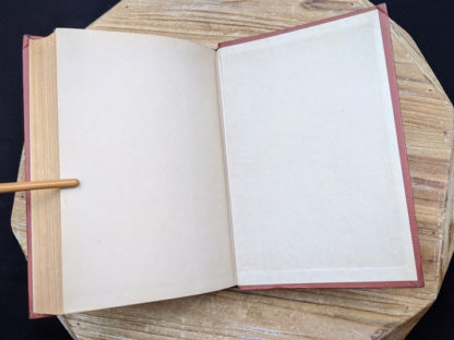 back pastedown and endpaper inside a 1943 copy of The Moon and Sixpence by W. Somerset Maugham - Photo-Play Edition
