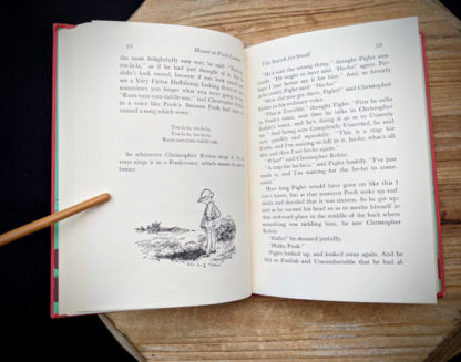 page 52 and 53 inside a 1961 copy of The House at Pooh Corner by A.A. Milne