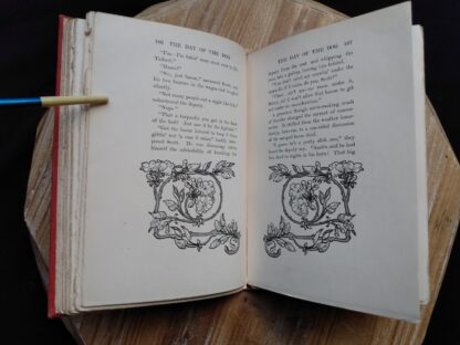 page 106 and 107 inside a 1904 copy of The Day of the Dog by George Barr McCutcheon - First Edition