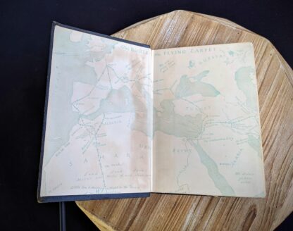 Front Paste down and endpaper inside a 1932 copy of The Flying Carpet by Richard Halliburton - First Edition