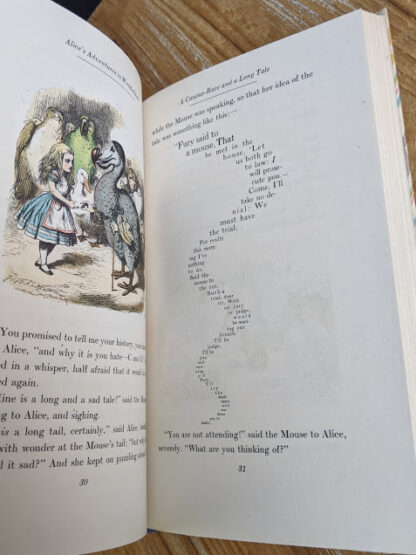 A Caucus-Race and a Long Tale - 1946 Alice’s Adventures in Wonderland - Two Volumes - by Lewis Carroll. Published by Random House, New York - Special Edition
