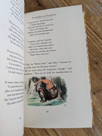 Tweedledum and Tweedledee inside a 1946 Through The Looking-Glass - Two Volumes - by Lewis Carroll. Published by Random House, New York - Special Edition with John Tenniel illustrations