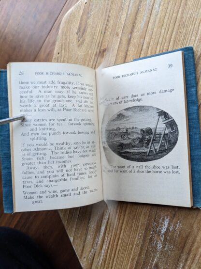 Illustrated black and white oval plate - Poor Richard's Almanac by Benjamin Franklin - The Gold Medal Library pocket book - undated