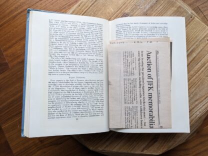 ephemera found inside; 1964 REPORT OF THE WARREN COMMISSION - The Assassination of President Kennedy published by Bantam Books Inc. - The New York Times Company